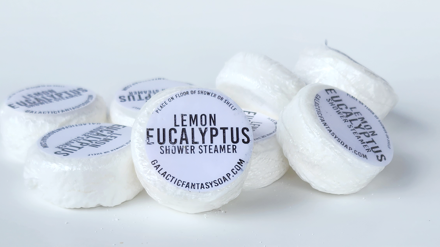 stacked lemon eucalyptus essential oil shower steamers in puck form white