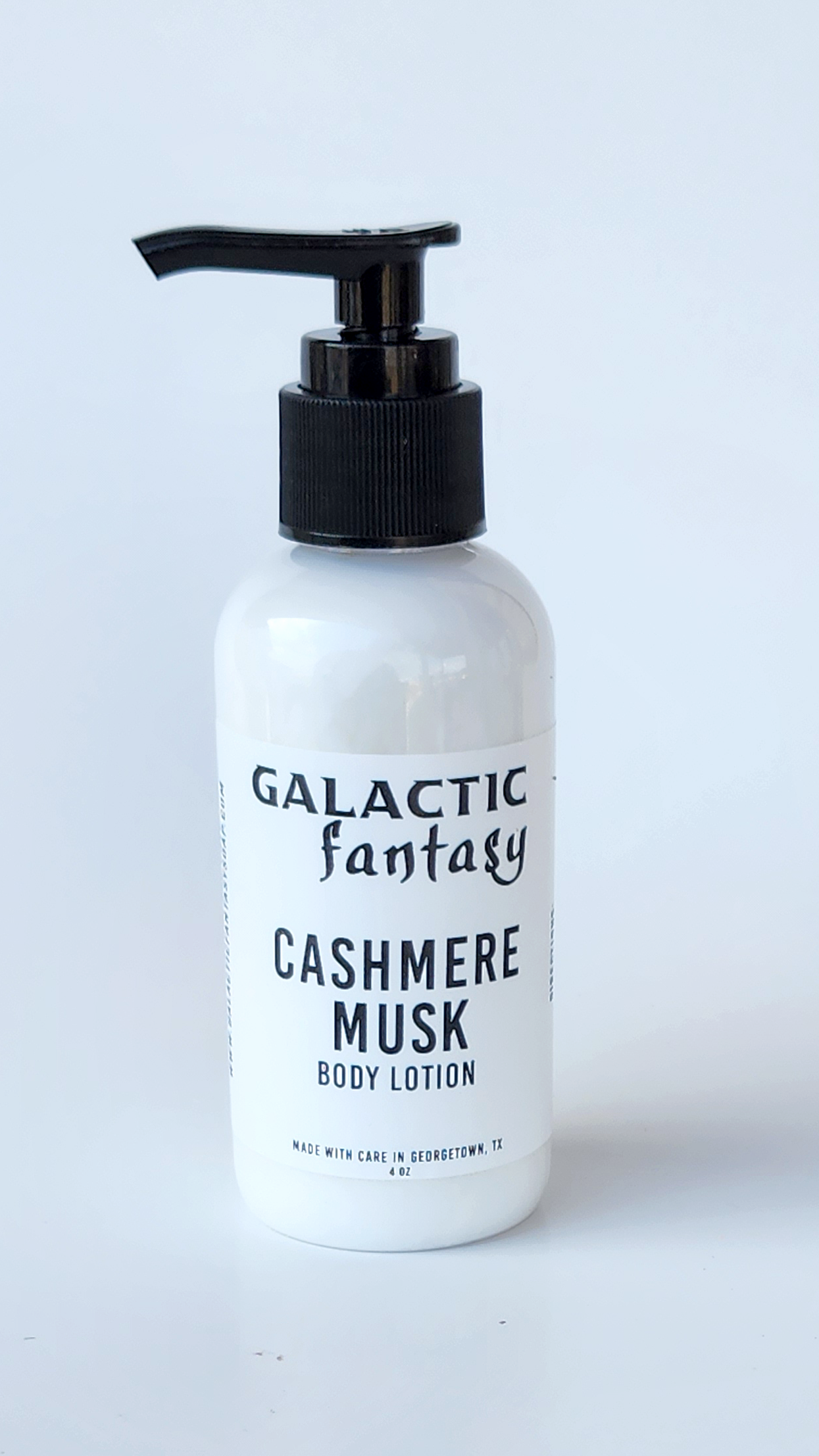 cashmere musk body lotion in a clear plastic pump bottle with black locking top